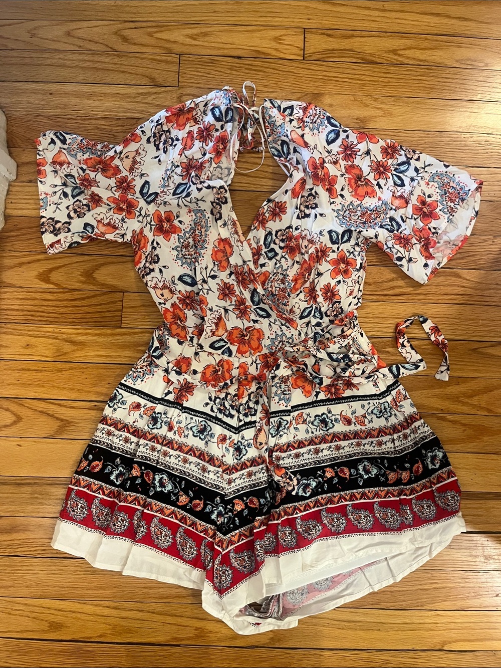 Francesca's Collections White Floral Tie-Waist Romper with Red & Black Accents